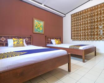 Super OYO 1927 Hotel Candra Adigraha - Denpasar - Habitación
