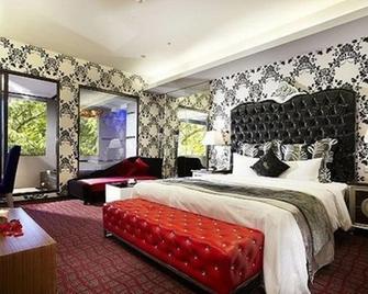 Golden Hot Spring Hotel - Taipei City - Bedroom
