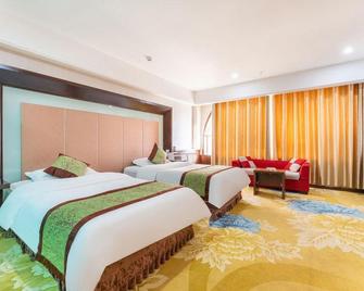 Dynasty Hotel - Jiayuguan - Slaapkamer