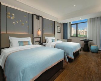 Till Bright Hotel, Changsha Yanghu University of Traditional Chinese Medicine - צ'נגשה - חדר שינה