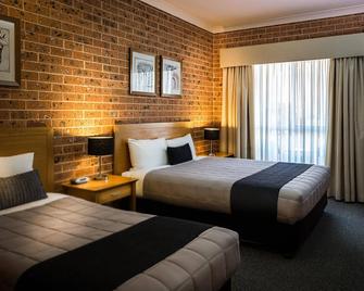 雅庫納汽車旅館暨公寓酒店 - 多寶 - 多寶 - 臥室