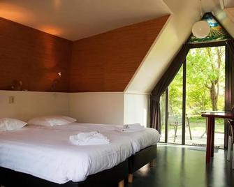 Hotelhuisjes Oosterleek - Oosterleek - Bedroom