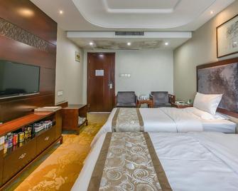 Laoying International Hotel - Shiyan - Slaapkamer