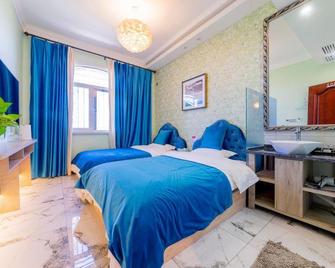 Xianyang Bund No.1 Hotel - Xianyang - Slaapkamer