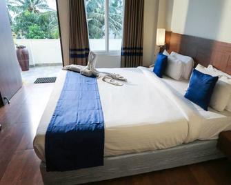 Sai Priya Beach Resort - Visakhapatnam - Schlafzimmer