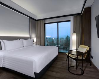 Grand Aston Puncak Hotel & Resort - 普卡 - 臥室