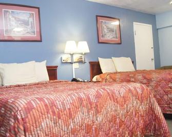 Holiday Lodge & Suites - McAlester - Schlafzimmer