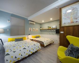 Tainan Travel Inn - Tainan - Yatak Odası