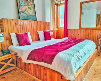 Hotel Devlok International - Kasol - Habitación