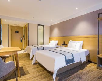 City Convenience Hotel (Guangzhou Xinshi Baixin Plaza) - Guangzhou - Bedroom