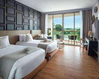 Wyndham Grand Nai Harn Beach Phuket (SHA Plus+) - עיירת פוקט - חדר שינה