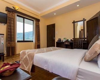 Hotel Peninsula Nepal - פוחארה - חדר שינה