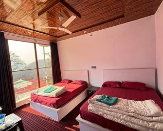 케다르 힐 리조트 - 케다르나트 - 침실