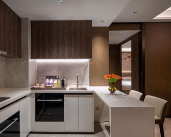 Yuexiu Hotel Guangzhou, Curio Collection by Hilton - גואנגג'ואו - חדר שינה