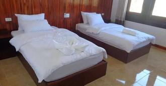 Phouluang Hotel - Phonsavan - Bedroom