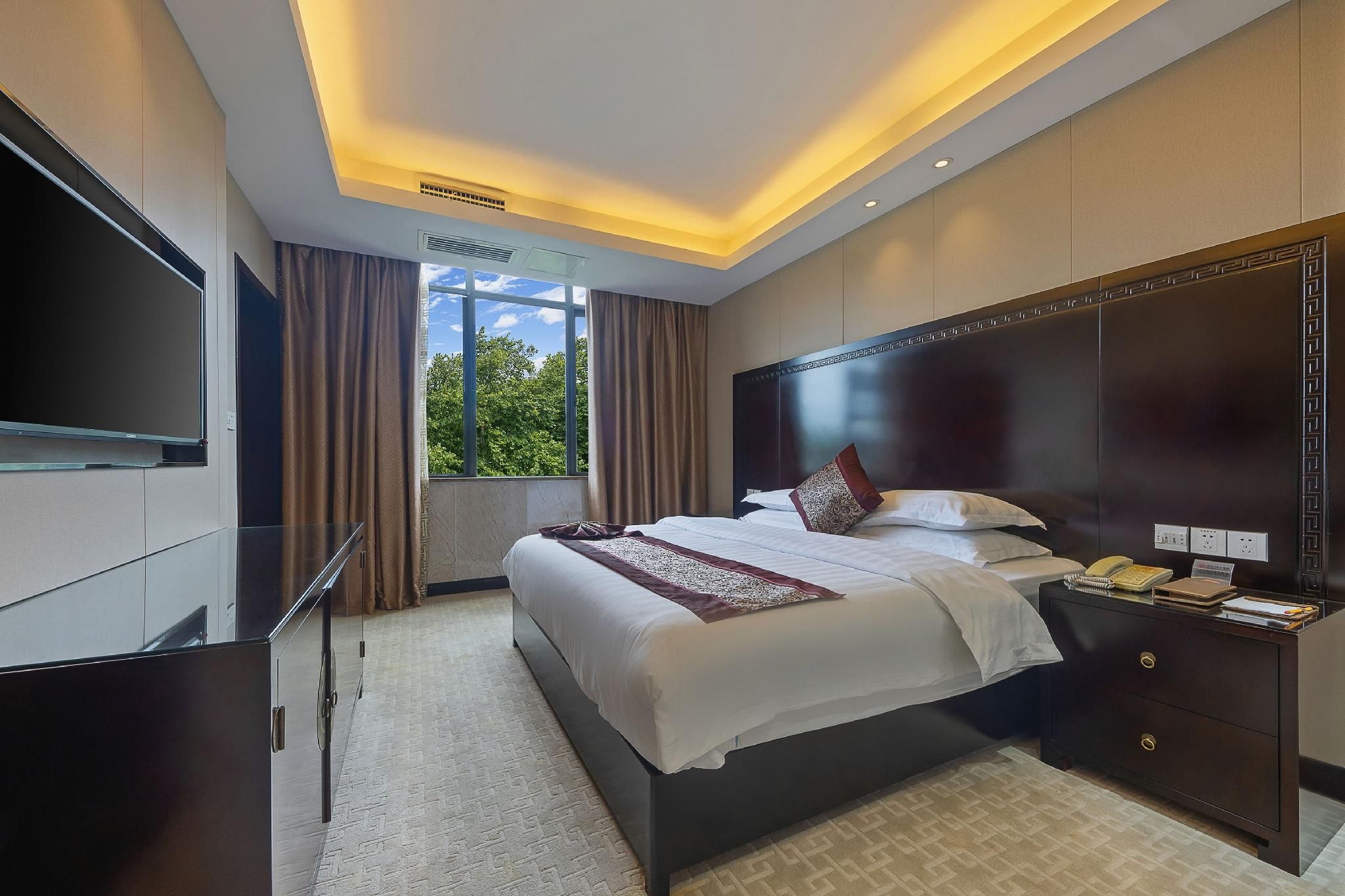 Wuyuan Ruiyi Xingjiangwan Holiday Hotel (Zhuzi Pedestrian Street) - Shangrao - Schlafzimmer