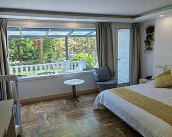 Binjiang Resort Center - שנחאי - חדר שינה