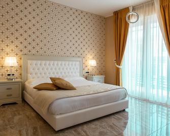 Aurum Suites - Pescara - Bedroom