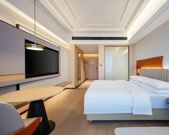 Vienna International Hotel (Wuhan Yangtze River 2nd Bridge Hankou Jiangtan) - Wuhan - Habitación