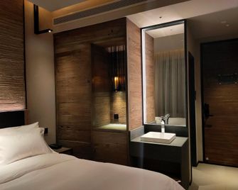 Jiayuguan Tuzhu Hotel - Jiayuguan - Schlafzimmer