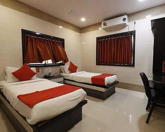Hotel Suraj Inn - Surat - Habitación