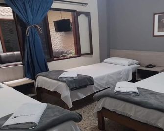 Hotel Caldas Plaza - Caldas - Habitación