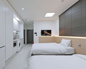 World Sky Residence Hotel - Sokcho - Slaapkamer