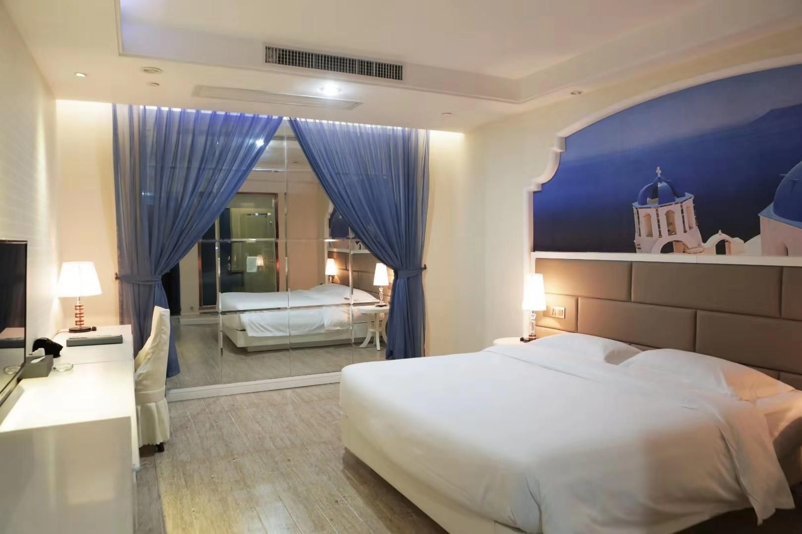 Huajun Hotel - שיאמן - חדר שינה