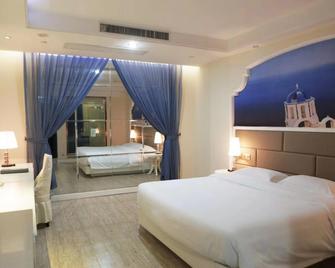 Huajun Hotel Xiamen - Ксіамен - Спальня