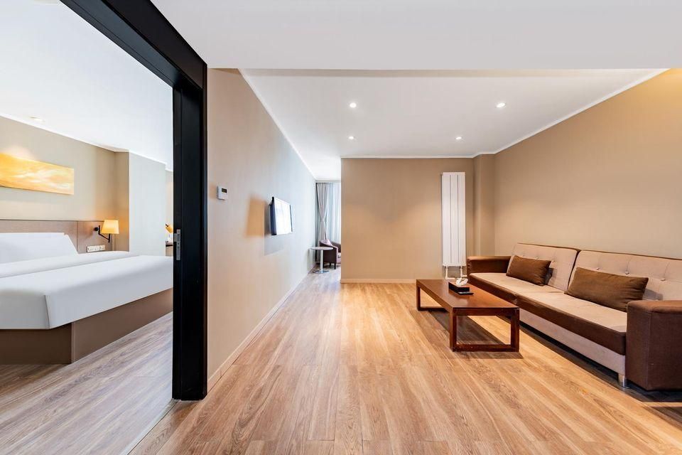 Home Inn Plus (Hohhot Zhongshan West Road) - هوهيهوت - غرفة نوم