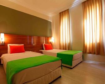 Sunlight Garden Hotel - Side - Bedroom