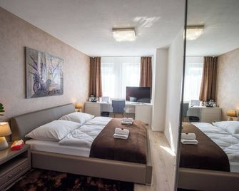 More Than Accommodation - ברטיסלבה - חדר שינה