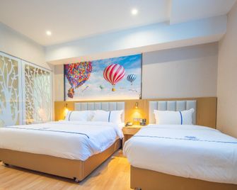 Aegean Art Hotel (Chaozhou People's Square Fortune Center) - Chaozhou - Bedroom