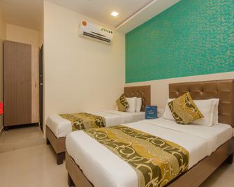 Super Hotel O Golden Nest Near Chhatrapati Shivaji International Airport - Mumbai - Bedroom