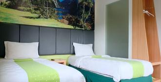 Arbor Biz Hotel - Makassar - Phòng ngủ