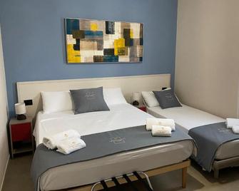 Valenti rooms & relax - Villaggio Mose - Habitación