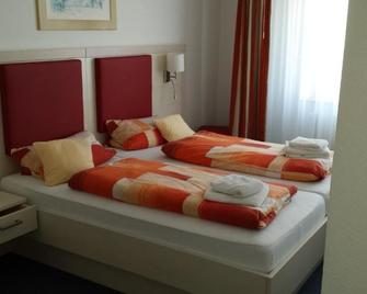 Hotel & Restaurant Möwchen - Norden - Slaapkamer