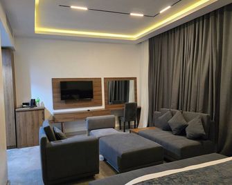 아이쿠 럭셔리 호텔 & 리조트 - 우요 - 거실