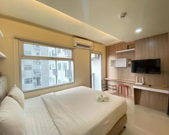 Cozy Designed Studio Apartment at Grand Asia Afrika By Travelio - Bandung - Chambre