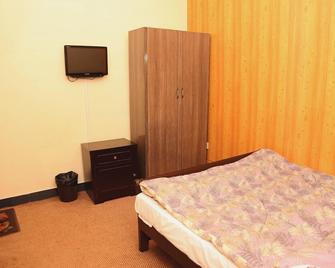 瑞士小屋豪華生活飯店 - 伊斯蘭堡 - 臥室
