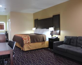 Express Inn and Suites - Humble - Bedroom