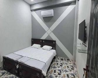 Al Qadir Residence - Multan - Habitación