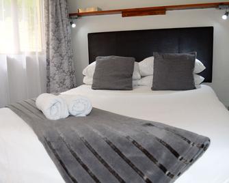 A Sunflower Stop Backpackers - קייפ טאון - חדר שינה