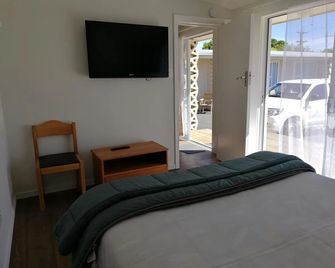 بايفيلد موتل آند أبارتمنت - دونيدين - غرفة نوم