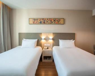 Hanting Hotel (Baotou Railway Station) - Baotou - Bedroom