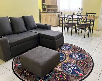 Emerald Aparment - Georgetown - Obývací pokoj