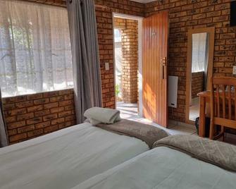 Emerald Guesthouse - Kempton Park - Camera da letto