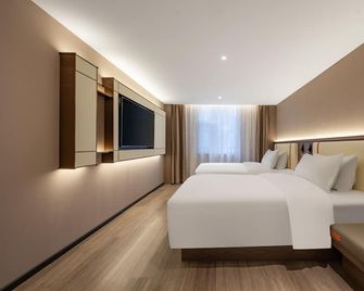 World Hotel - Джінан - Спальня