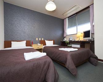 Hotel Select Inn Nishinasuno Ekimae - Nasushiobara - Bedroom