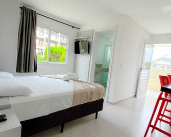 Hospeda Mariscal Flat - Bombinhas - Спальня